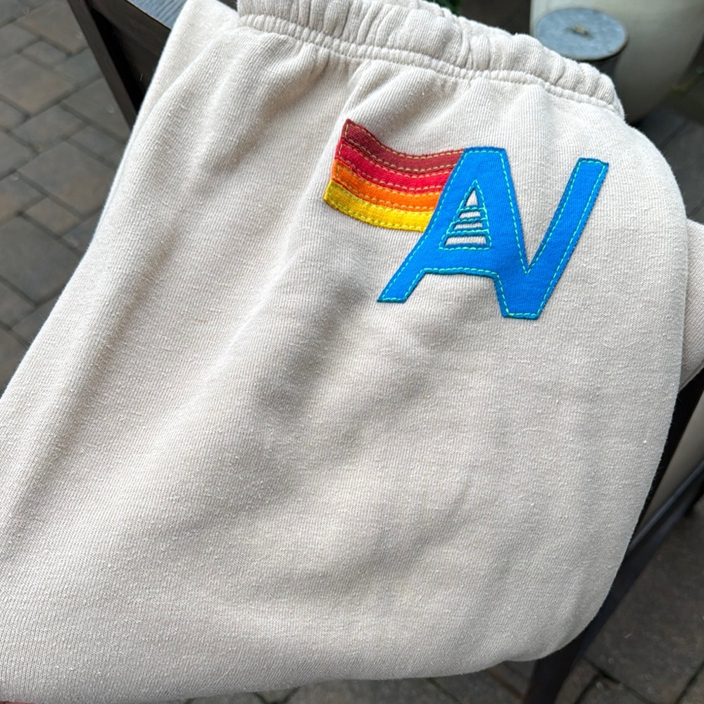 Aviator Nation Cream Track Joggers with Rainbow 'AN' Patch